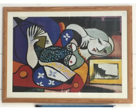 A large colour print after Picasso depicting a portrait of a lady