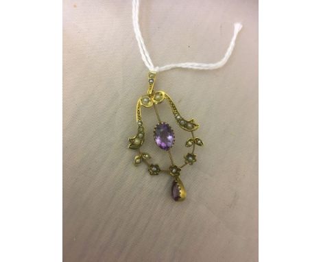 An Edwardian 9ct amethyst and seed pearl pendant