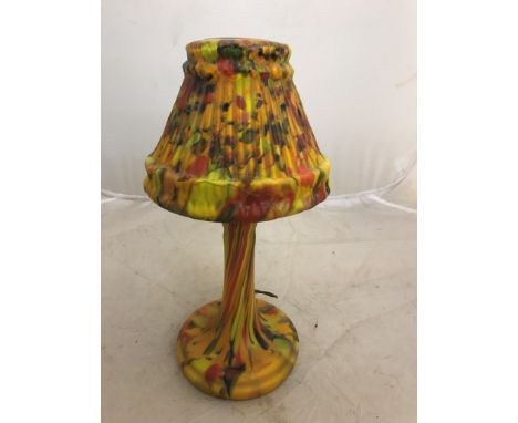 A multi-coloured glass lamp