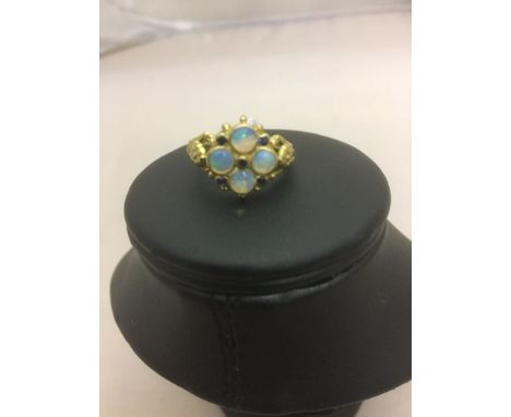 A 9ct opal and sapphire dress ring