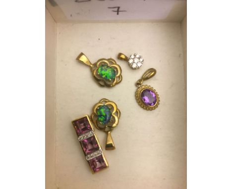 Four 9ct gold pendants, diamond, amethyst etc