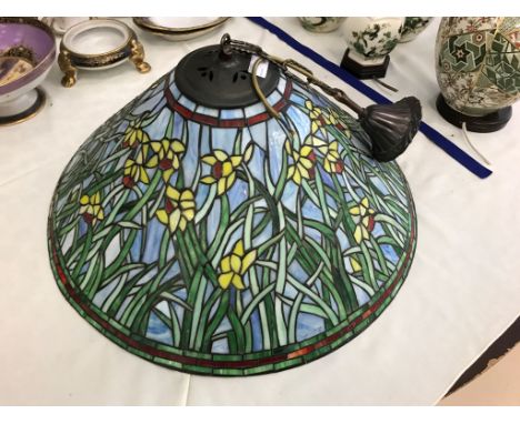 A large Tiffany-style lamp