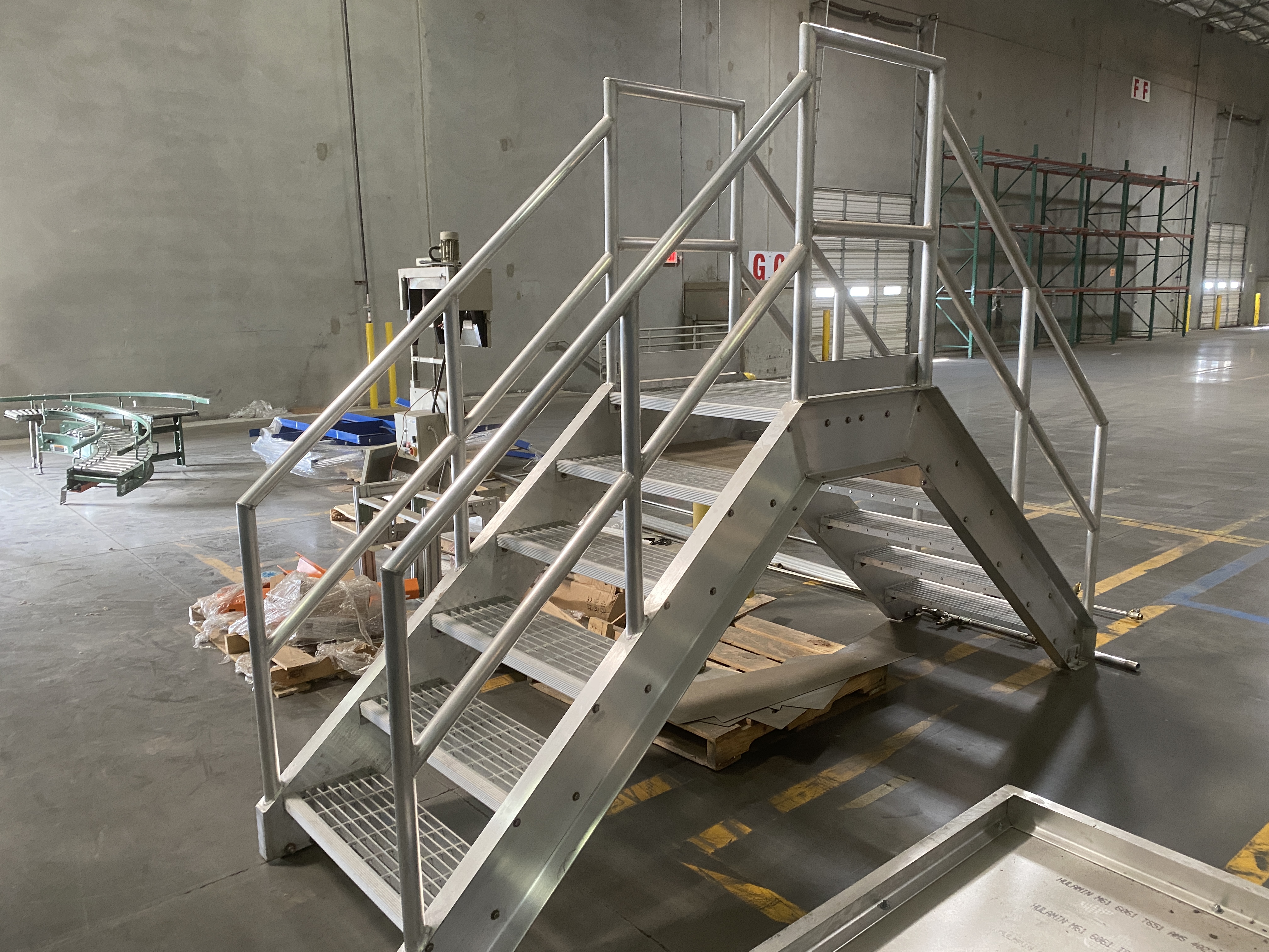 Aluminum cross over stairway, 5 steps with safety rails (Located at 600 ...