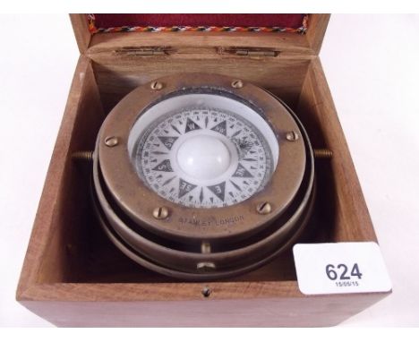 A ships compass in box 