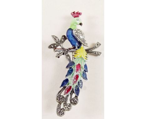 A vintage enamel and marcasite peacock brooch 
