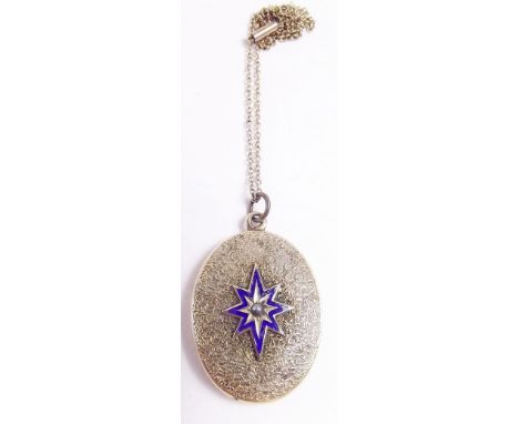 A Victorian gold oval locket decorated enamel star set seed pearl and gold chain 
