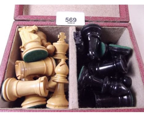 A wooden chess set - boxed