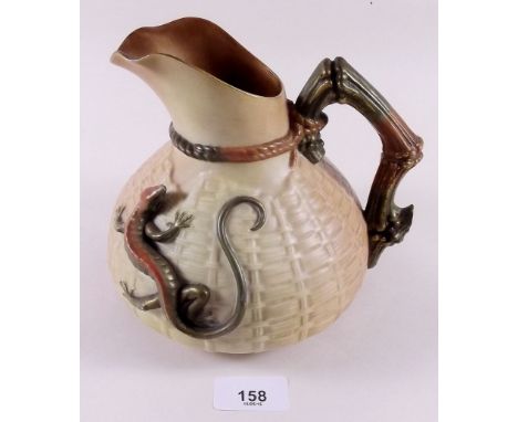 A Royal Worcester ivory blush and gilt basketweave jug with applied lizard No 1714