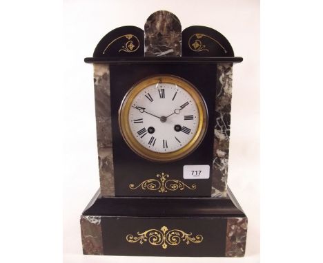 A Victorian black slate mantel clock