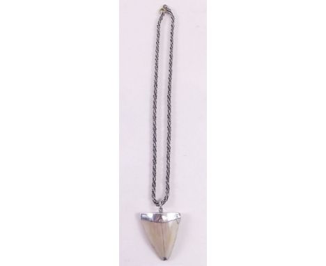 A silver mounted sharks tooth and chain - dated 10th July 1869  