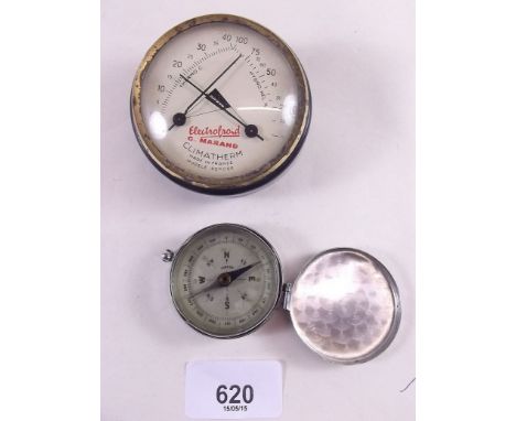 An old compass and a 'Climatherm' barometer hydrometer