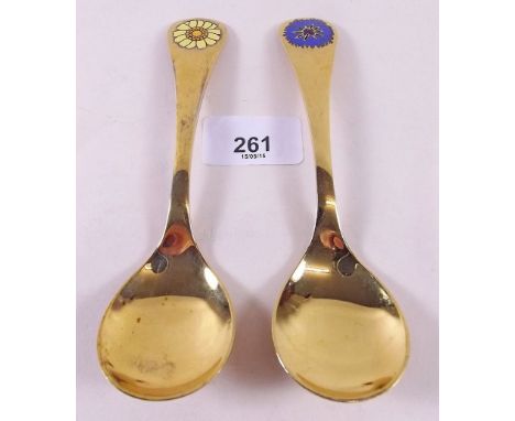 Two Georg Jensen silver gilt year spoons with floral enamel terminals for 1972 and 1973
