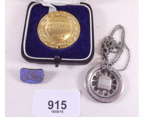 A Rolls Royce silver 'Silver Jubilee' pendant and chain and a Bath Concours gilt medallion