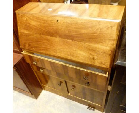 Vintage walnut bureau with fitted interior and two drawers over two cupboards