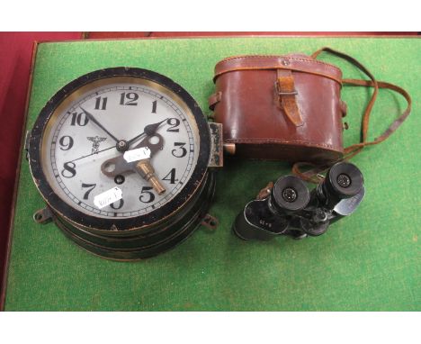 A German Third Reich Kriegsmarine Bulkhead U Boat Clock, Reichsadler with M beneath on Arabic numeral dial, 15990 N to face a