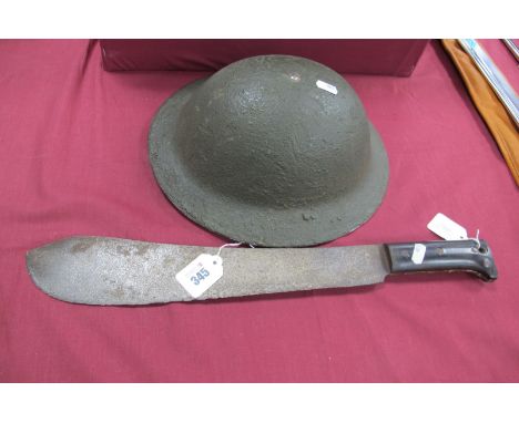 WWII British Brodie Helmet, with canvas chin strap and new liner. Plus WWII era machete, bakelite grips and rusted blade with