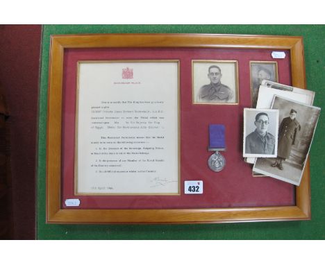 WWII Egyptian Medal For Meritorious Acts (Silver) with Ribbon, certificate, photograph and newspaper cutting in picture frame