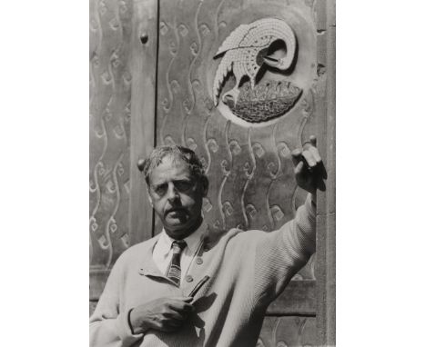 Mataré, Ewald -- Photographer: Heinz Sangermann. Portrait of Ewald Mataré and the Pope's and Bishop's Doors of the south port