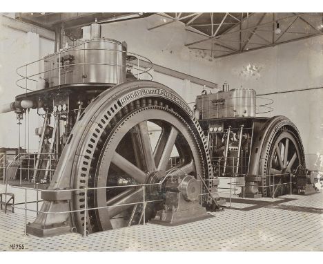 Industrial Photography -- Photographer unknown. Two early electric generators in the machine room of the AEG company. 1896. V