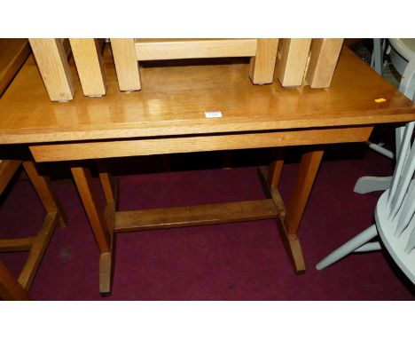 A 1930s light oak side table, w.86.5cm 