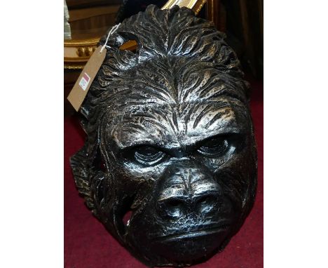 A large contemporary silvered ceramic model head of a gorilla, height 39cm