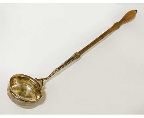 GEORGIAN SILVER WINE LADLE WITH A SMALL DENT TO THE SIDE