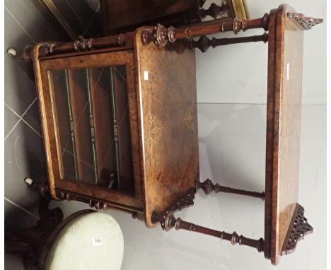 Victorian burr walnut music cabinet with boxwood stringing and inlay. The lower glazed cupboard revealing titled shelves. Res