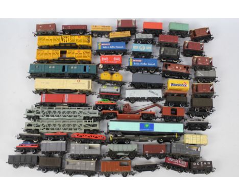 Hornby - Lima - Roco - 55 x unboxed wagons in OO / HO scale including car transporters, flat trucks and box vans. They show s