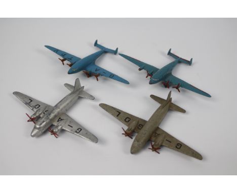 Dinky Toys - Four unboxed Dinky Toys model aircraft. Lot consists of Dinky 62R Four Engine liner - 2 variants - one in blue a