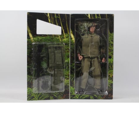 InToyz - A boxed IntToyz 1:6 scale 'Armed Forces Modern Series' US Sniper action figure. The figure and accessories appear to