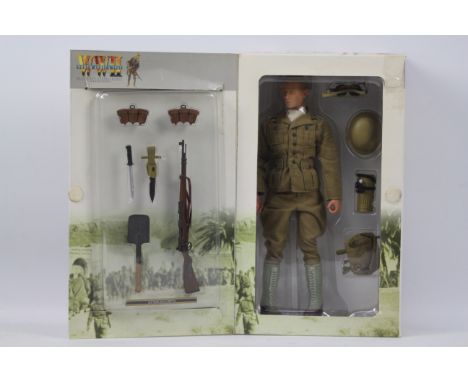 Dragon - A boxed Dragon #70100 1:6 scale WW2 North Africa 1942 "Reinhardt Mossl" Deutsches Afrika Korps (Gerfreiter). The fig