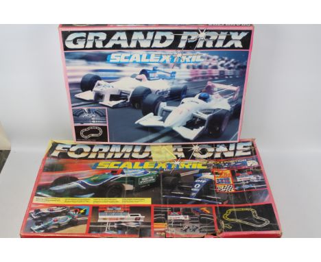 Scalextric - Formula One - Grand Prix. Two boxed sets of Scalextric. Grand Prix: some sunbleaching to box but otherwise in Ex