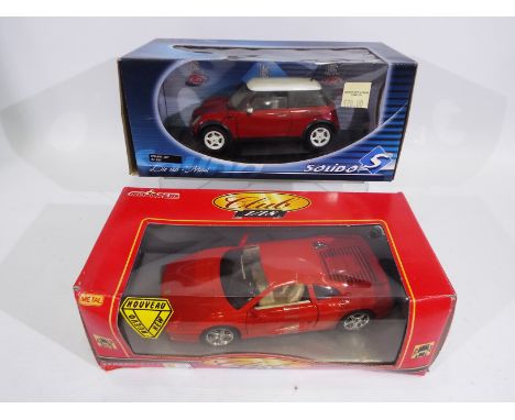 Majorette, Solido - Two boxed die-cast model vehicles - Lot includes a 1:18 scale #4419 Ferrari F355 and a 1:18 scale Solido 