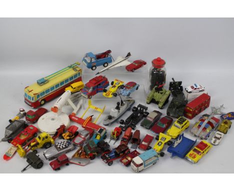 Hot Wheels - Dinky Toys - Corgi Toys. A selection of Approx. Forty loose and boxed diecast models and tyres ranging from play