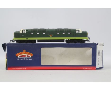 Hornby - an OO gauge model diesel hydraulic locomotive, running no D9016, BR green livery with yellow ends, # R3497, label on