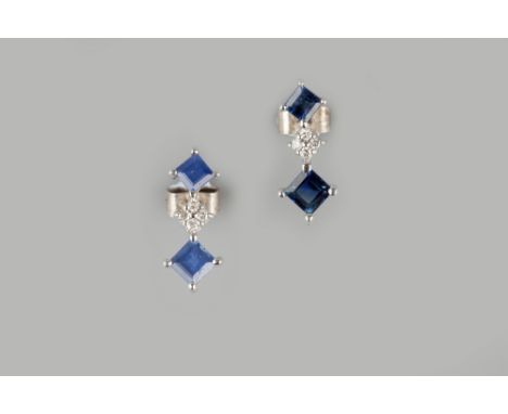 A PAIR OF SAPPHIRE AND DIAMOND EARSTUDS, each with two square step-cut sapphires, spaced by a cluster of round brilliant-cut 