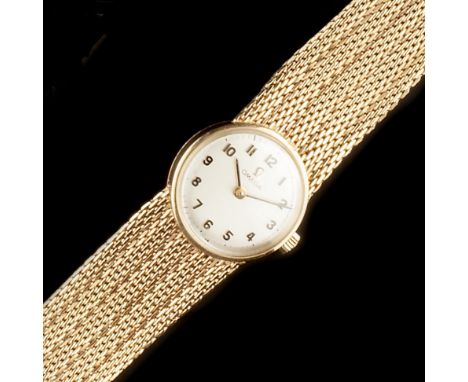 A LADY'S 9CT GOLD BRACELET WATCH BY OMEGA,  the circular signed silvered dial with black Arabic numerals, to manual wind move