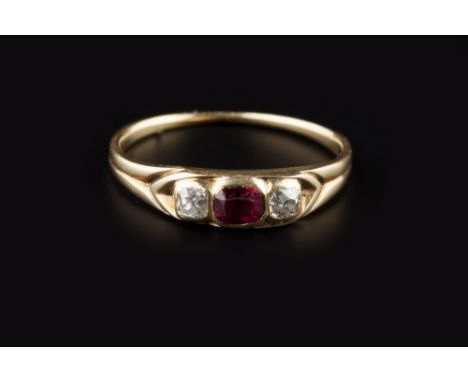 A RUBY AND DIAMOND THREE STONE RING,  the cushion-shaped mixed-cut ruby in collet setting, between two similarly set cushion-