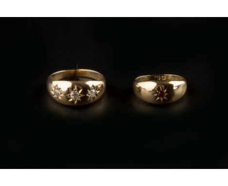 TWO GEM SET GYPSY RINGS, comprising a diamond three stone gypsy ring, and a ruby single stone gypsy ring, both 18ct gold moun