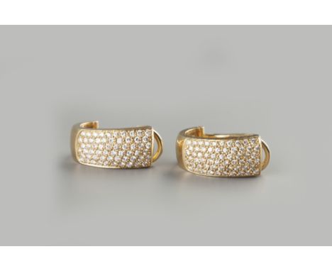 A PAIR OF DIAMOND SET EARHOOPS, each tapered half-hoop with a pavè set cluster of round brilliant-cut diamonds, on post and h