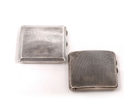 AN ENGINE TURNED SILVER SHAPED CIGARETTE CASE, Chester 1924; and another 1927, 8 troy oz (2)