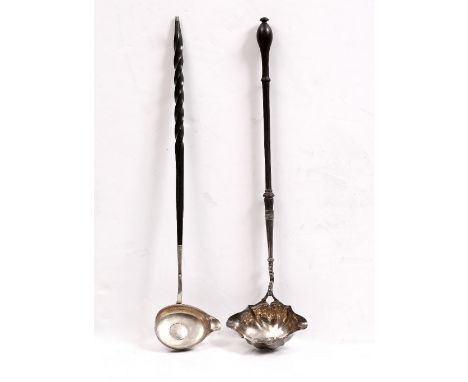 A GEORGE II SILVER PUNCH LADLE with turned boxwood handle, London 1751 by George Campar, 39cm long; and another punch ladle i