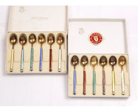 A SET OF SIX SILVER GILT AND VARI-COLOURED ENAMEL COFFEE SPOONS by David Anderson, boxed; and another similar set (2)