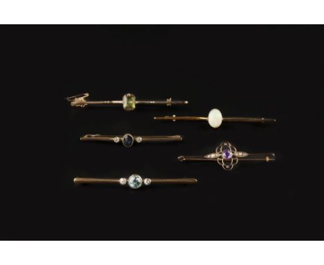 A COLLECTION OF GEM SET BAR BROOCHES, comprising a blue zircon and diamond three stone bar brooch, an opal single stone bar b