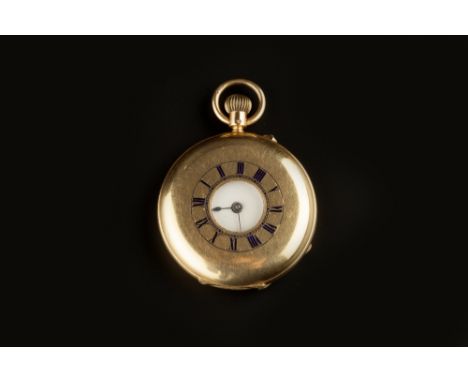 A LATE VICTORIAN 18CT GOLD HALF HUNTER POCKET WATCH, the white enamel dial with Roman numerals and outer minute scale, to a k