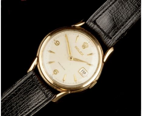 A GENTLEMAN'S 9CT GOLD 'PRECISION' WRISTWATCH BY ROLEX, the circular signed silvered dial with Arabic numerals at 6 and 9, ar