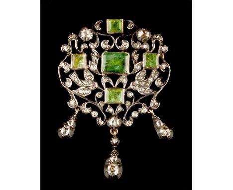 A 19TH CENTURY EMERALD AND DIAMOND PANEL BROOCH, the openwork panel of rose and lasque-cut diamond set foliate scrolls and bi