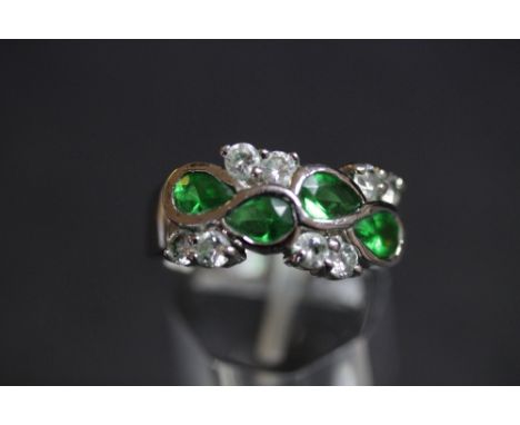 White sapphire and green stone silver ring