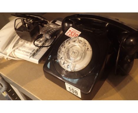 BT black Rotary phone push button example and Nokia phone