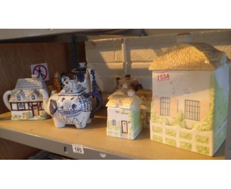 Selection of cottage ceramic ware tea coffee and sugar with biscuit barrel etc 